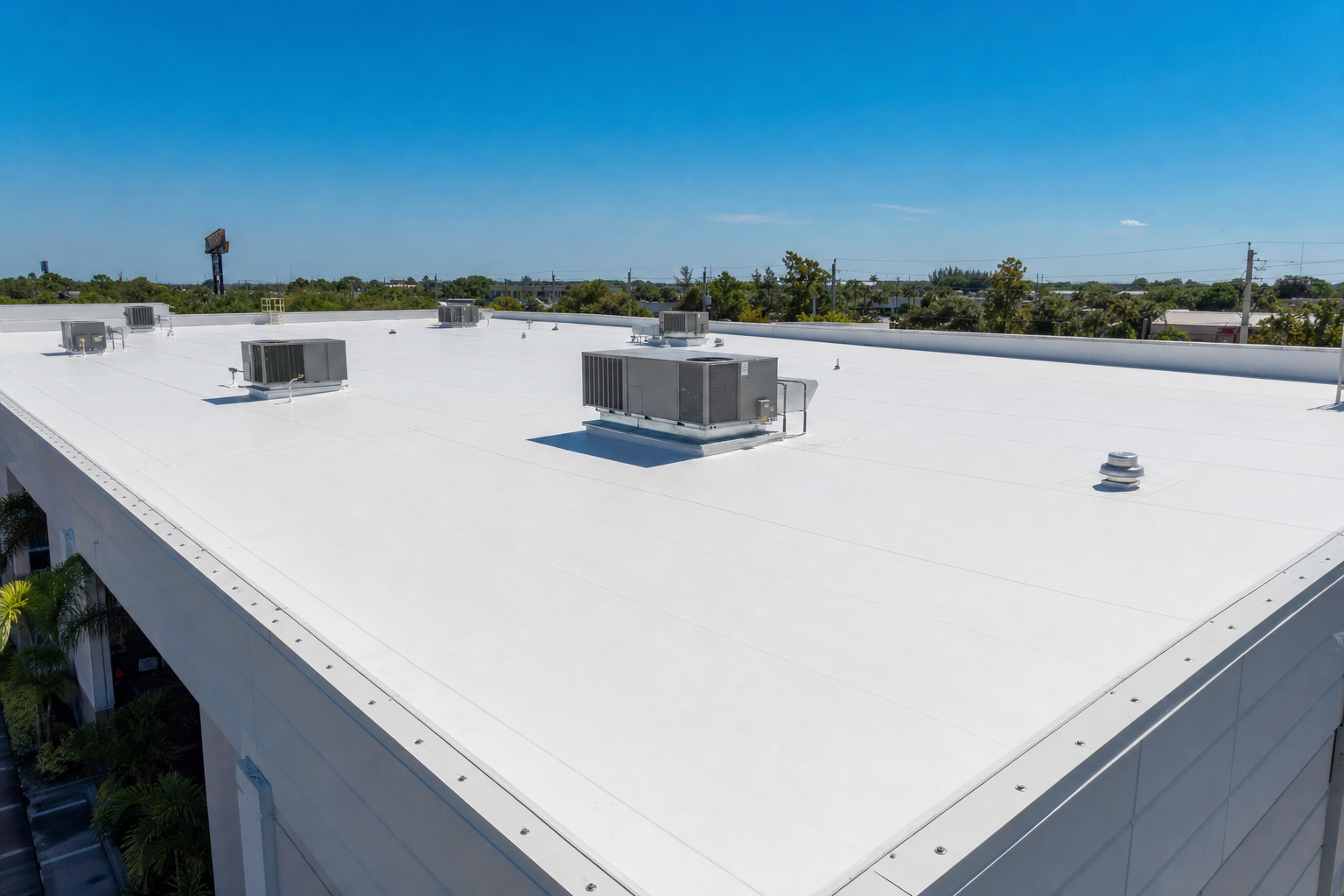 Commercial building with white TPO flat roof membrane